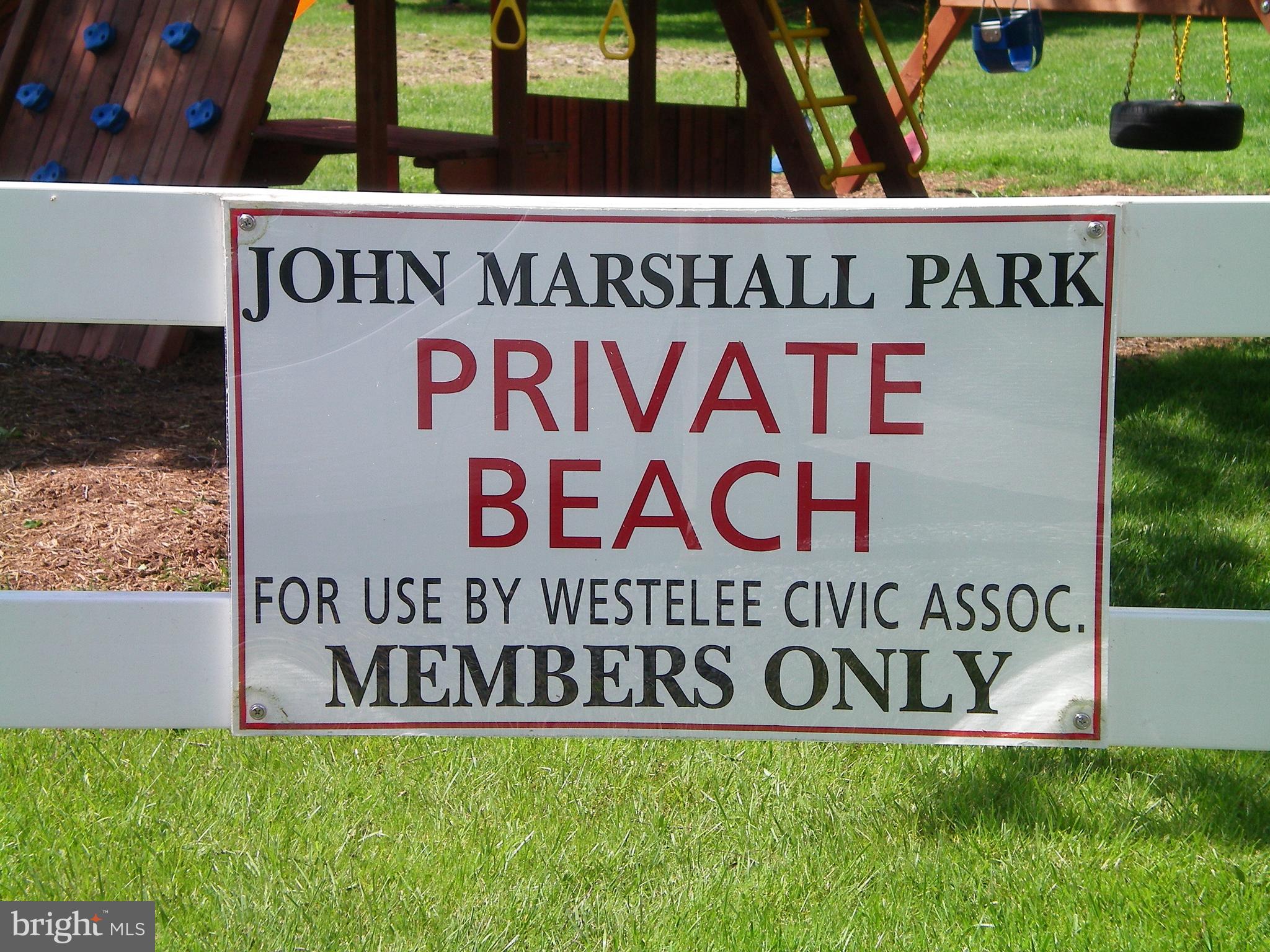 1209 Johnson Drive Shady Side, MD 20764 - Photo 30 of 37 a sign on the side of a building