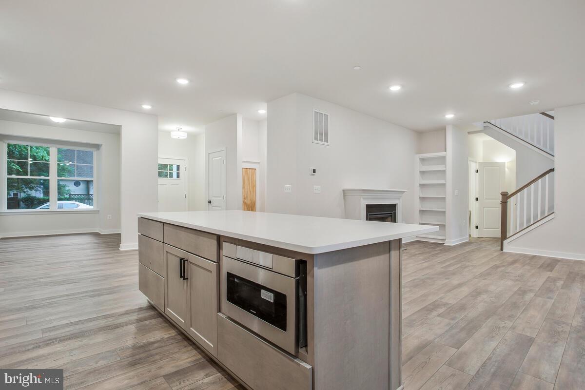 1209 Johnson Drive Shady Side, MD 20764 - Photo 5 of 37 a kitchen with a stove and a sink