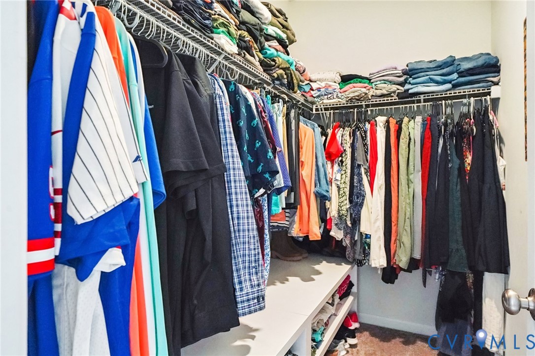 243 Bellevue Circle Aylett, VA 23009 - Photo 21 of 34 a view of walk in closet with clothes