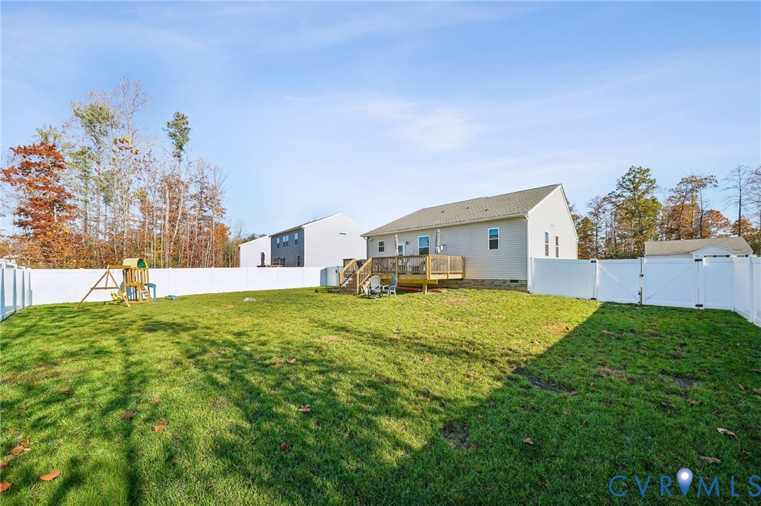 243 Bellevue Circle Aylett, VA 23009 - Photo 30 of 34 a front view of house with yard and trees