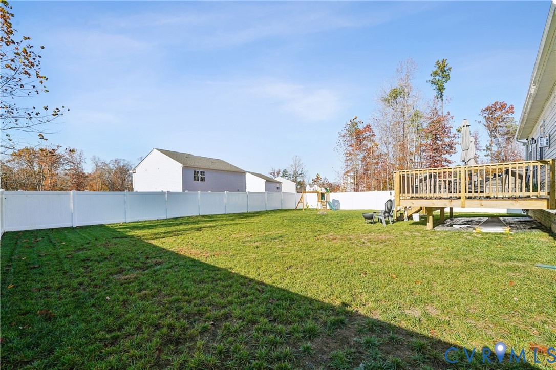 243 Bellevue Circle Aylett, VA 23009 - Photo 31 of 34 a view of a house with a yard
