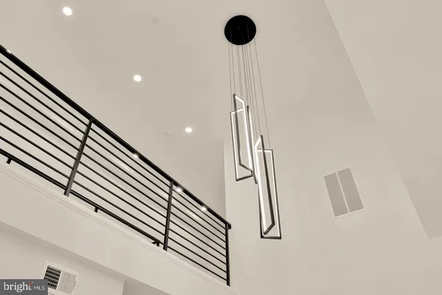 a kitchen with stainless steel appliances a refrigerator and a stove