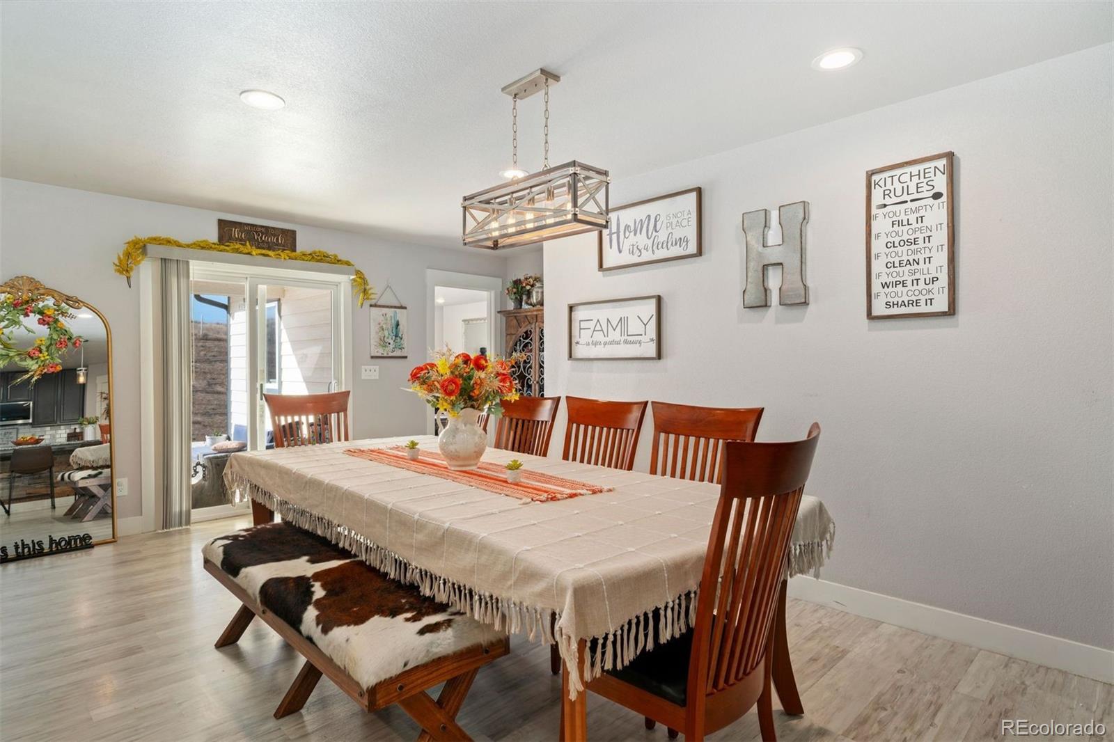 16477 Stoneleigh Road Platteville, CO 80651 - Photo 14 of 37 a view of a dining room with furniture