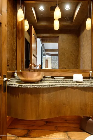 a view of a swimming pool with a table and chairs