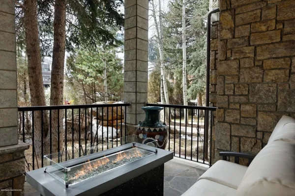 a view of balcony with wooden floor