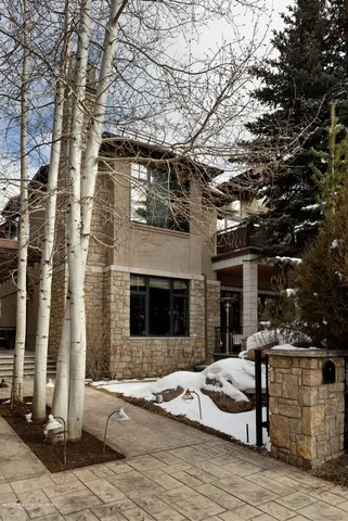 a outdoor space of a house with garage