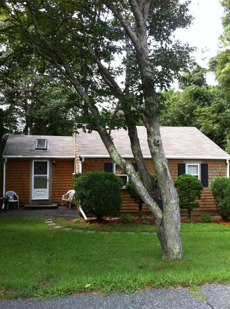 205 Lincoln Road Hyannis, MA 02601 - Photo 1 of 10 a view of a house with backyard and garden
