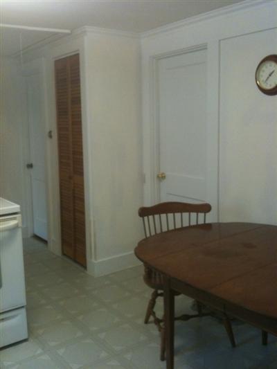205 Lincoln Road Hyannis, MA 02601 - Photo 6 of 10 a view of a room that has a table and chair in it