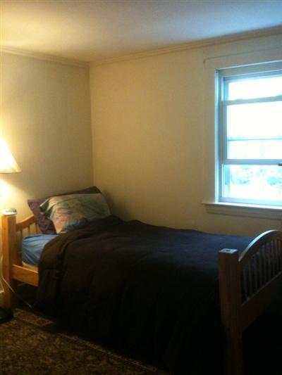 205 Lincoln Road Hyannis, MA 02601 - Photo 10 of 10 a bed sitting in a bedroom next to a window