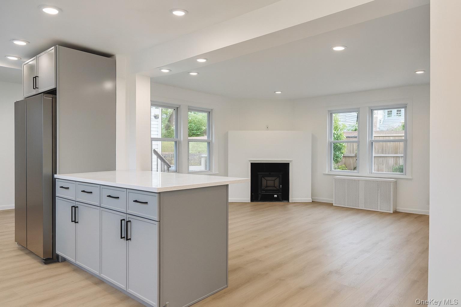 88 Cold Spring Road Liberty, NY 12754 - Photo 9 of 28 a view of kitchen with granite countertop cabinets and fireplace