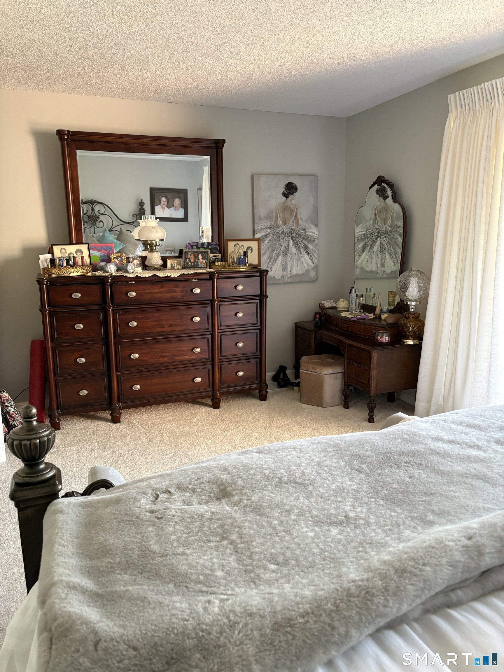 32 Upper Pattagansett Road, Unit 30 East Lyme, CT 06333 - Photo 14 of 28 a bedroom with a bed and wooden floor