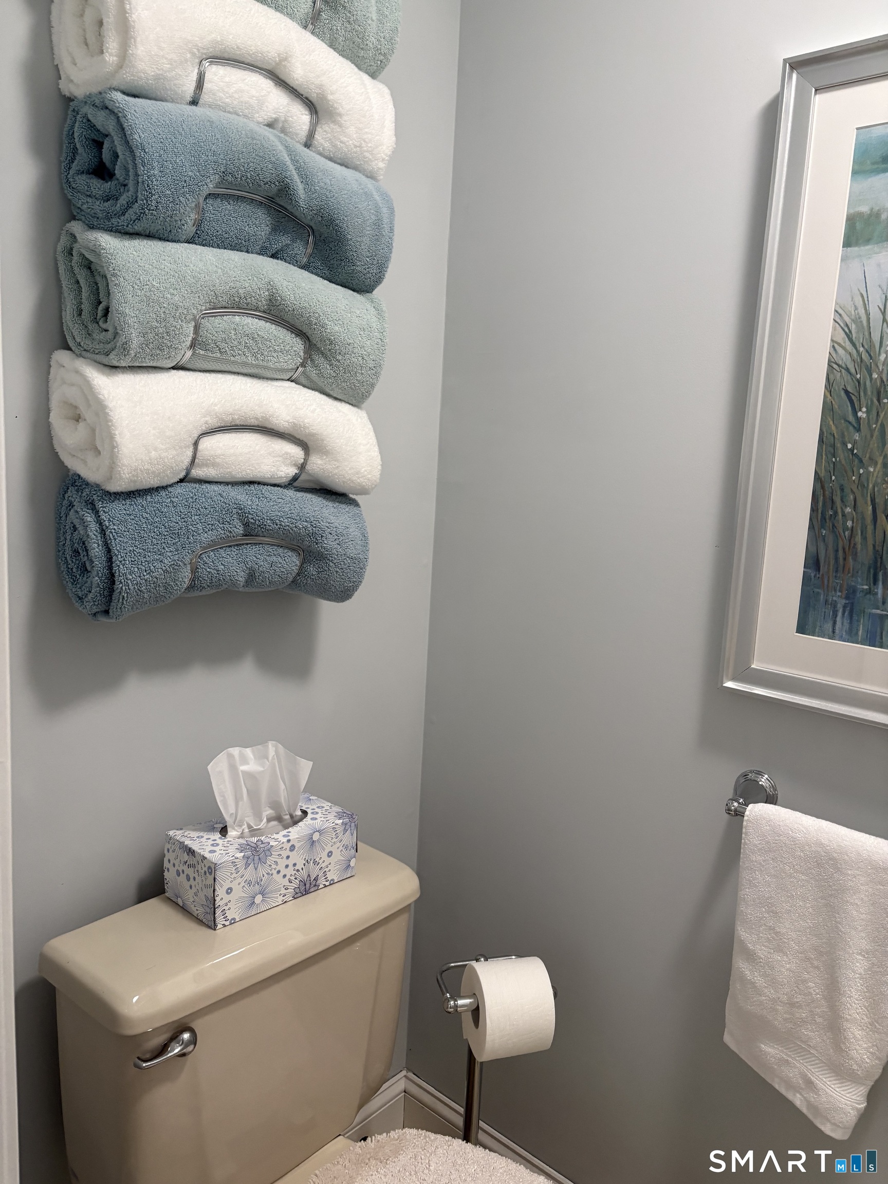 32 Upper Pattagansett Road, Unit 30 East Lyme, CT 06333 - Photo 17 of 28 a bathroom with a toilet sink and mirror