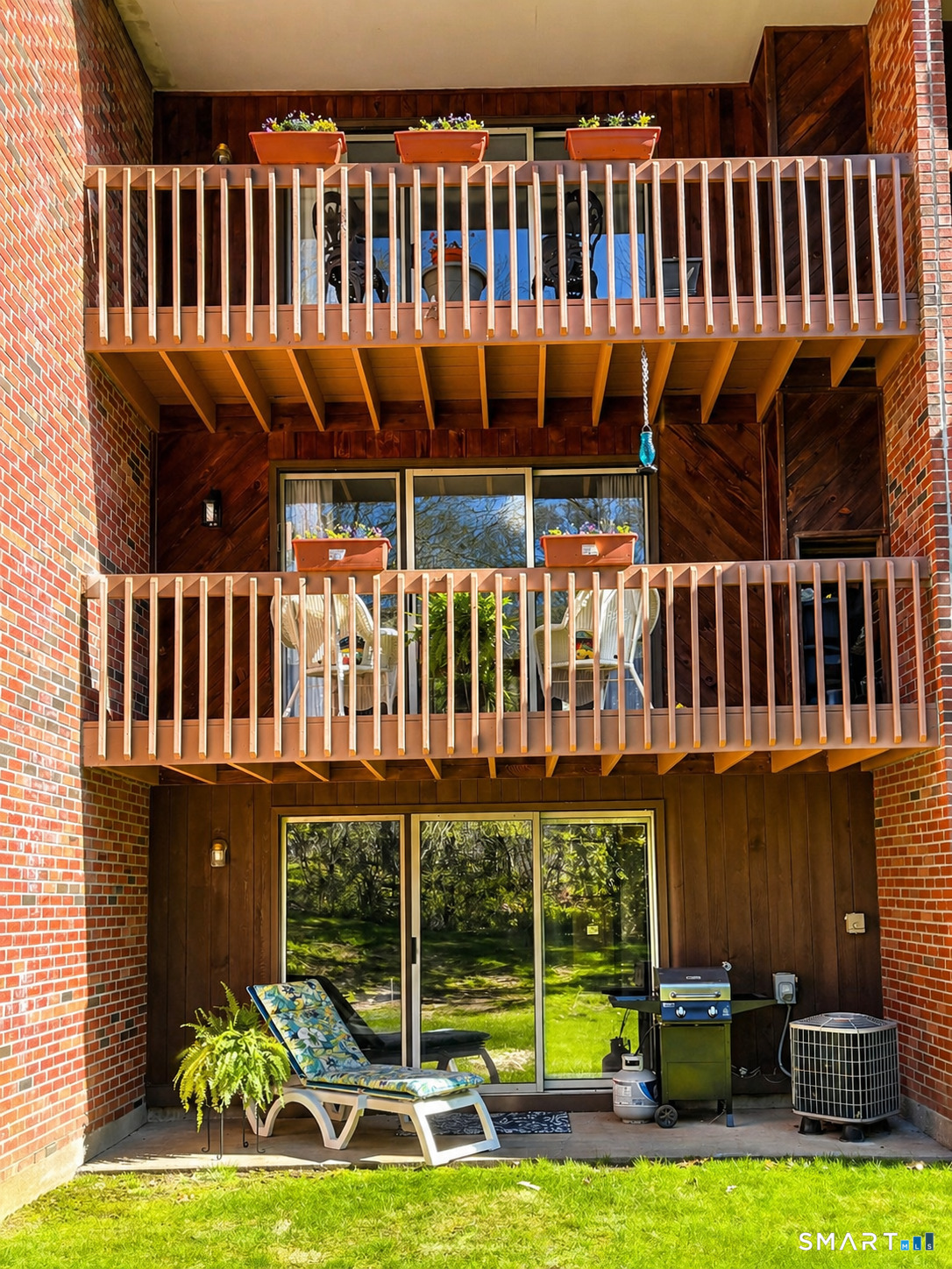 32 Upper Pattagansett Road, Unit 30 East Lyme, CT 06333 - Photo 2 of 28 a view of a house with a deck and a yard