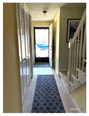 32 Upper Pattagansett Road, Unit 30 East Lyme, CT 06333 - Photo 3 of 28 a view of a hallway to a livingroom with furniture
