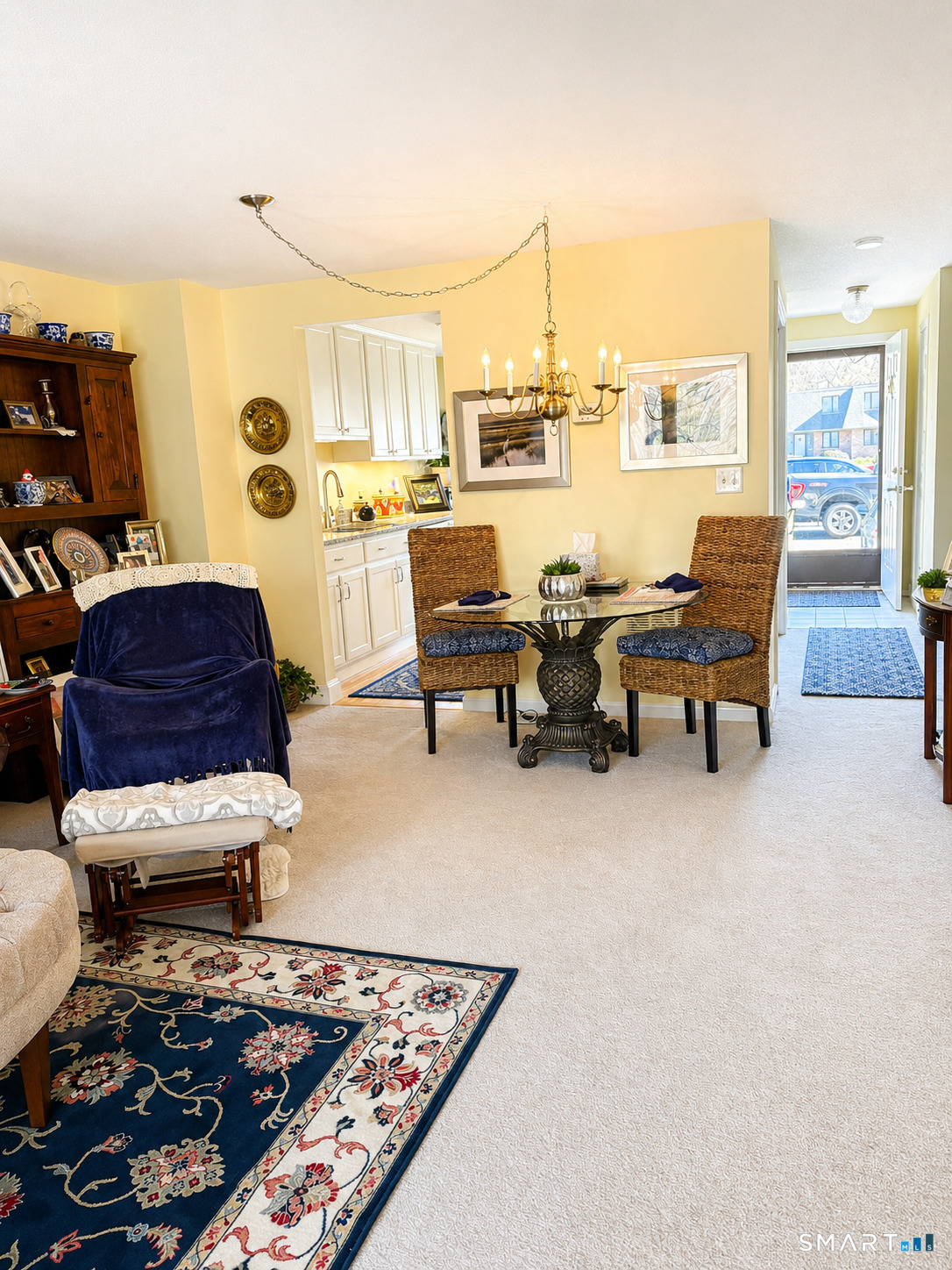 32 Upper Pattagansett Road, Unit 30 East Lyme, CT 06333 - Photo 7 of 28 a living room with furniture and a rug