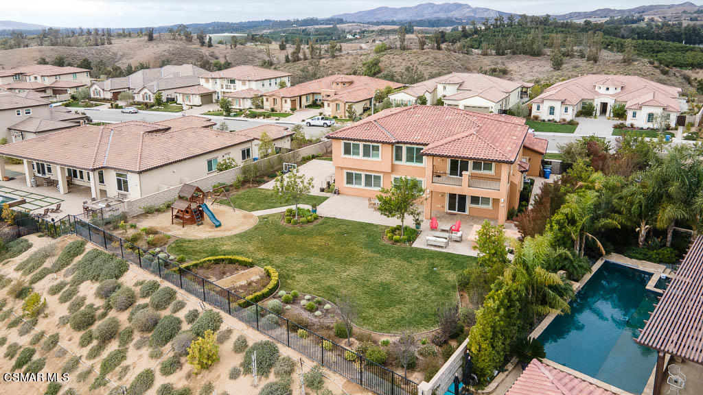 7342 Nicklaus Road Moorpark, CA 93021 - Photo 3 of 55 an aerial view of residential houses with outdoor space and parking