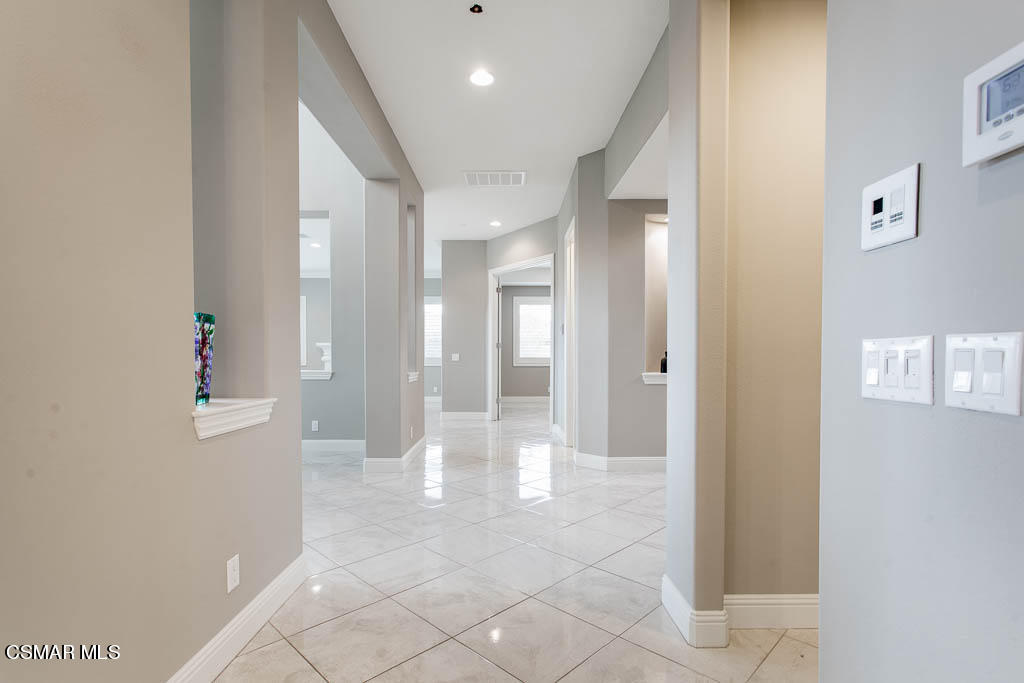 7342 Nicklaus Road Moorpark, CA 93021 - Photo 26 of 55 a bathroom with a glass door shower
