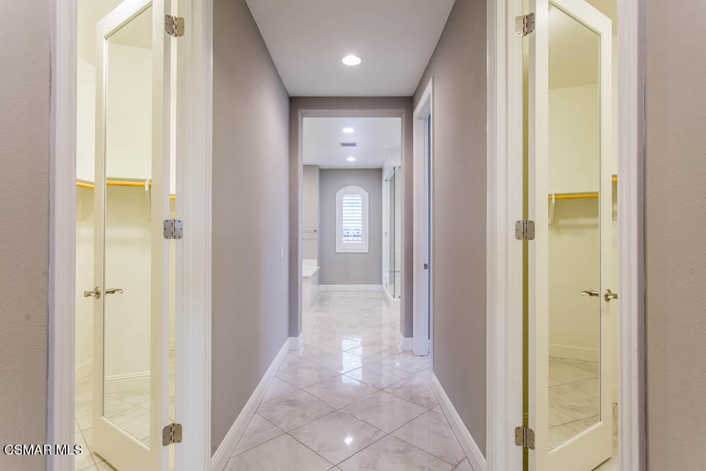 7342 Nicklaus Road Moorpark, CA 93021 - Photo 35 of 55 a view of a hallway with wooden floor