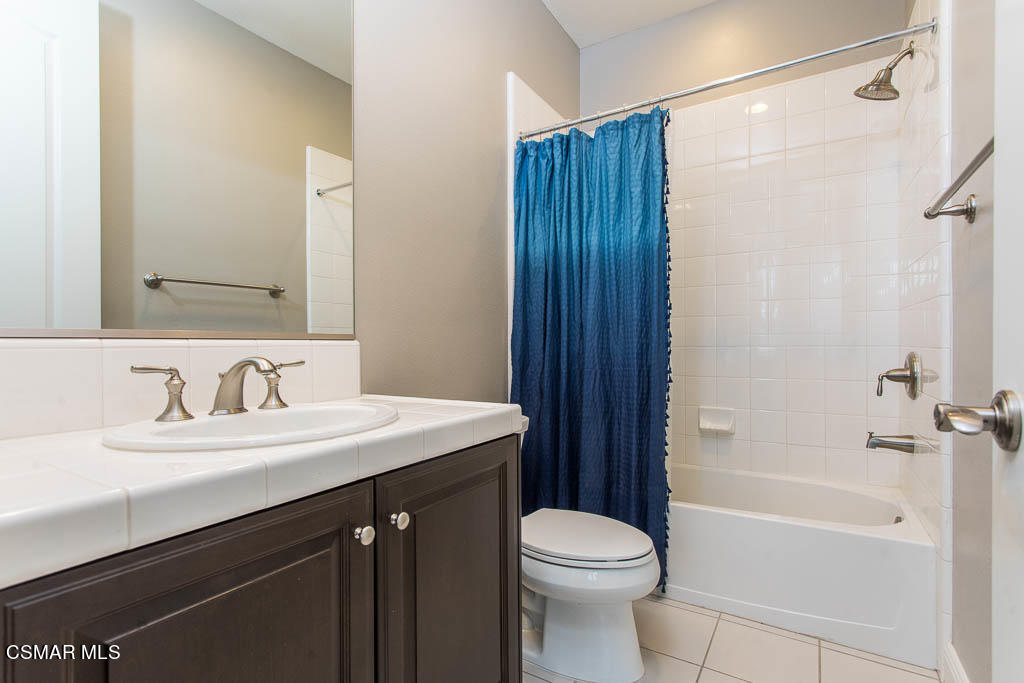 7342 Nicklaus Road Moorpark, CA 93021 - Photo 42 of 55 a bathroom with a sink a toilet and shower