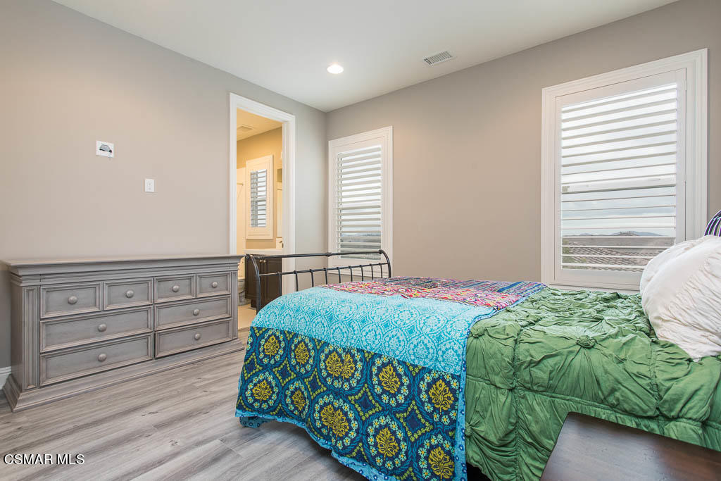 7342 Nicklaus Road Moorpark, CA 93021 - Photo 43 of 55 a bedroom with a bed and a window