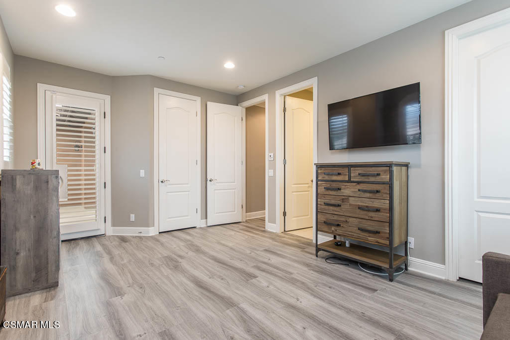 7342 Nicklaus Road Moorpark, CA 93021 - Photo 45 of 55 a view of room with wooden floor and furniture