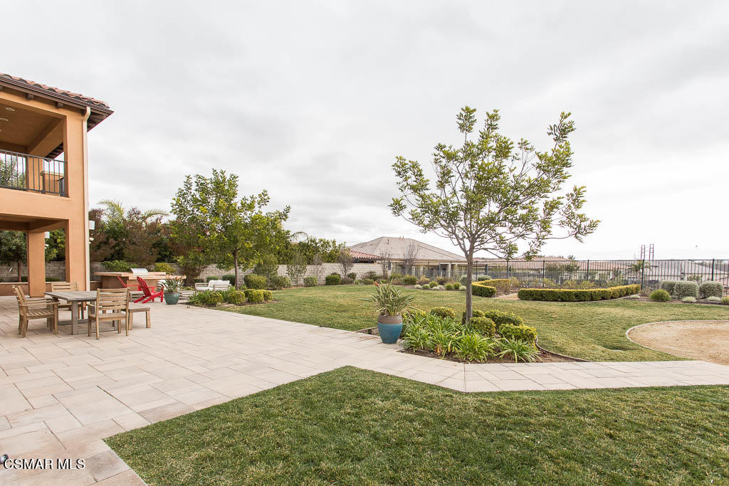7342 Nicklaus Road Moorpark, CA 93021 - Photo 54 of 55 a view of a lake with a yard and potted plants