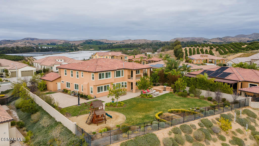 7342 Nicklaus Road Moorpark, CA 93021 - Photo 7 of 55 an aerial view of residential houses with outdoor space and river