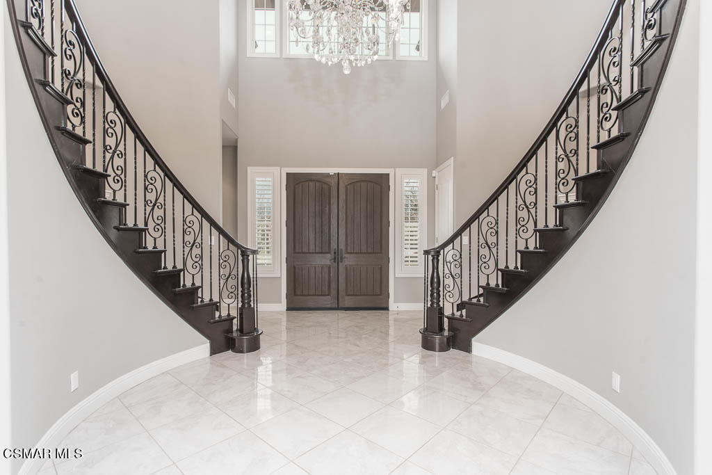 7342 Nicklaus Road Moorpark, CA 93021 - Photo 10 of 55 a view of staircase with wooden floor and stairs