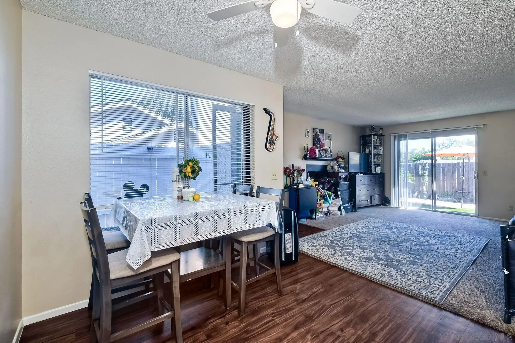 1160 Corral Glen Escondido, CA 92026 - Photo 6 of 16 a view of a dining room with furniture window and wooden floor