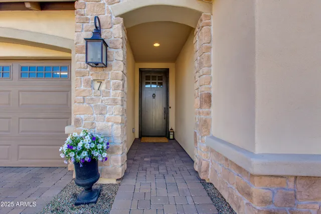 a front view of a house with a pots