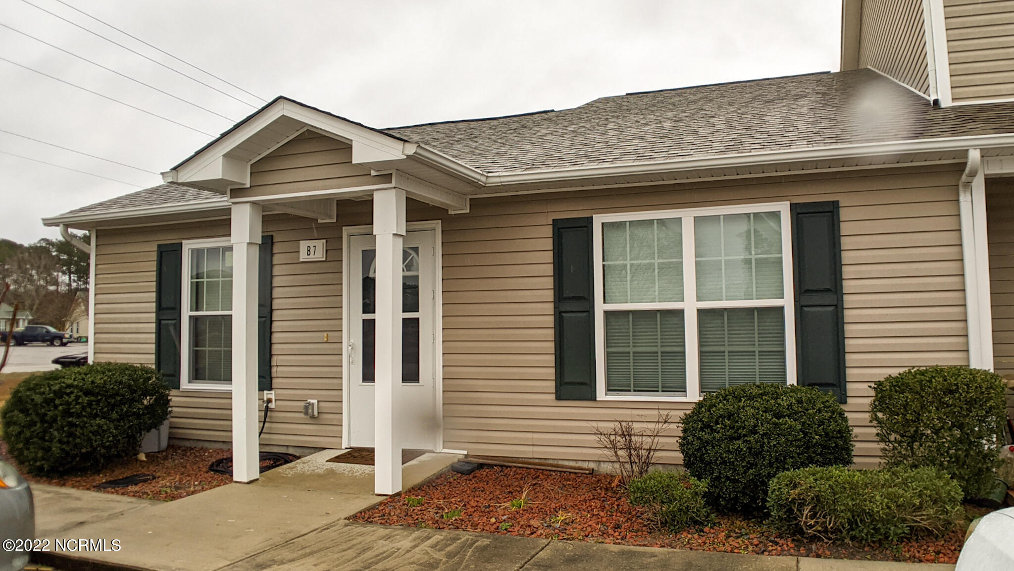 601 Peletier Loop Road, Unit B7 Swansboro, NC 28584 - Photo 1 of 19 End unit, single story