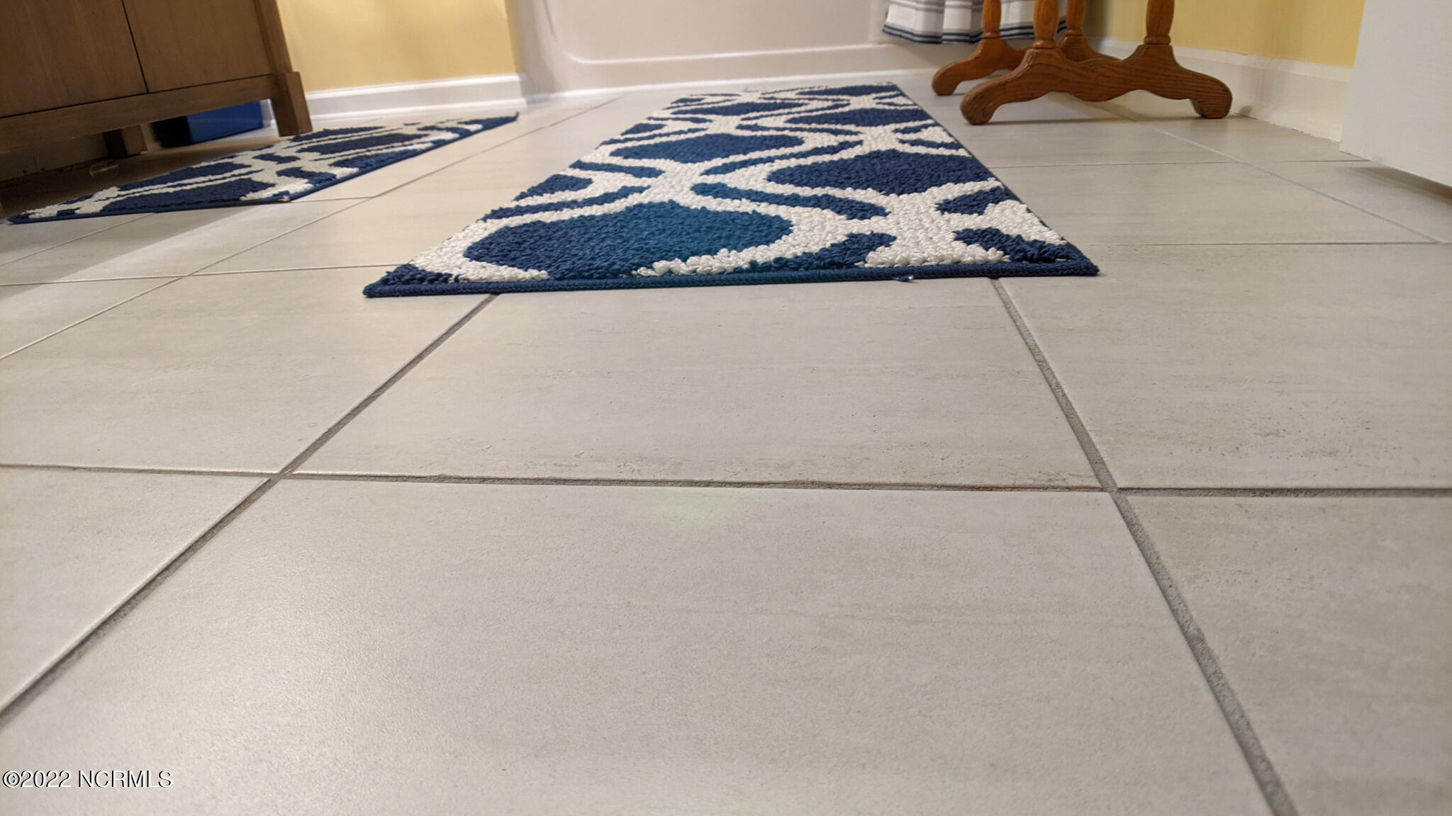 601 Peletier Loop Road, Unit B7 Swansboro, NC 28584 - Photo 14 of 19 2nd bath flooring