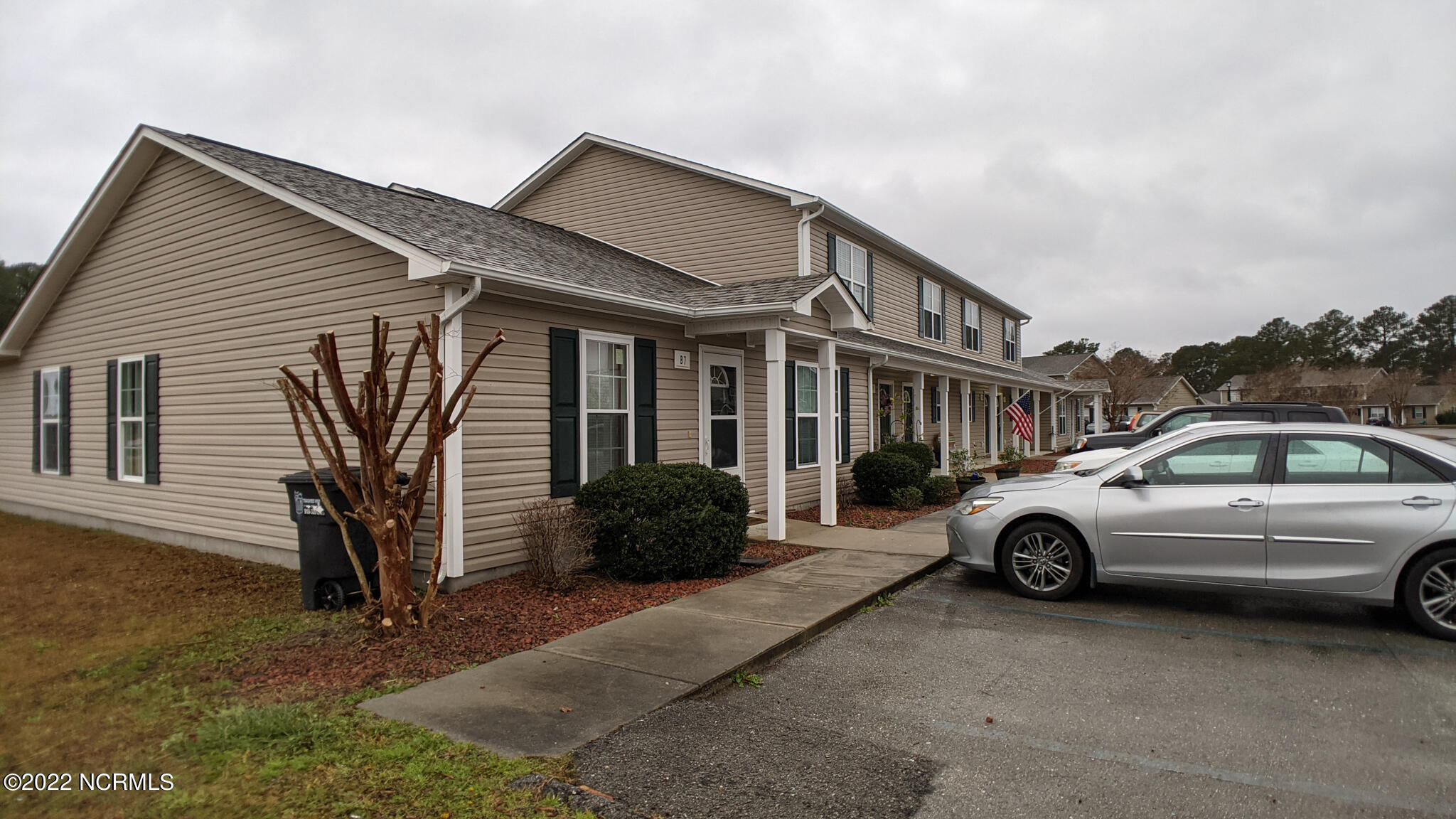 601 Peletier Loop Road, Unit B7 Swansboro, NC 28584 - Photo 17 of 19 Exterior end unit