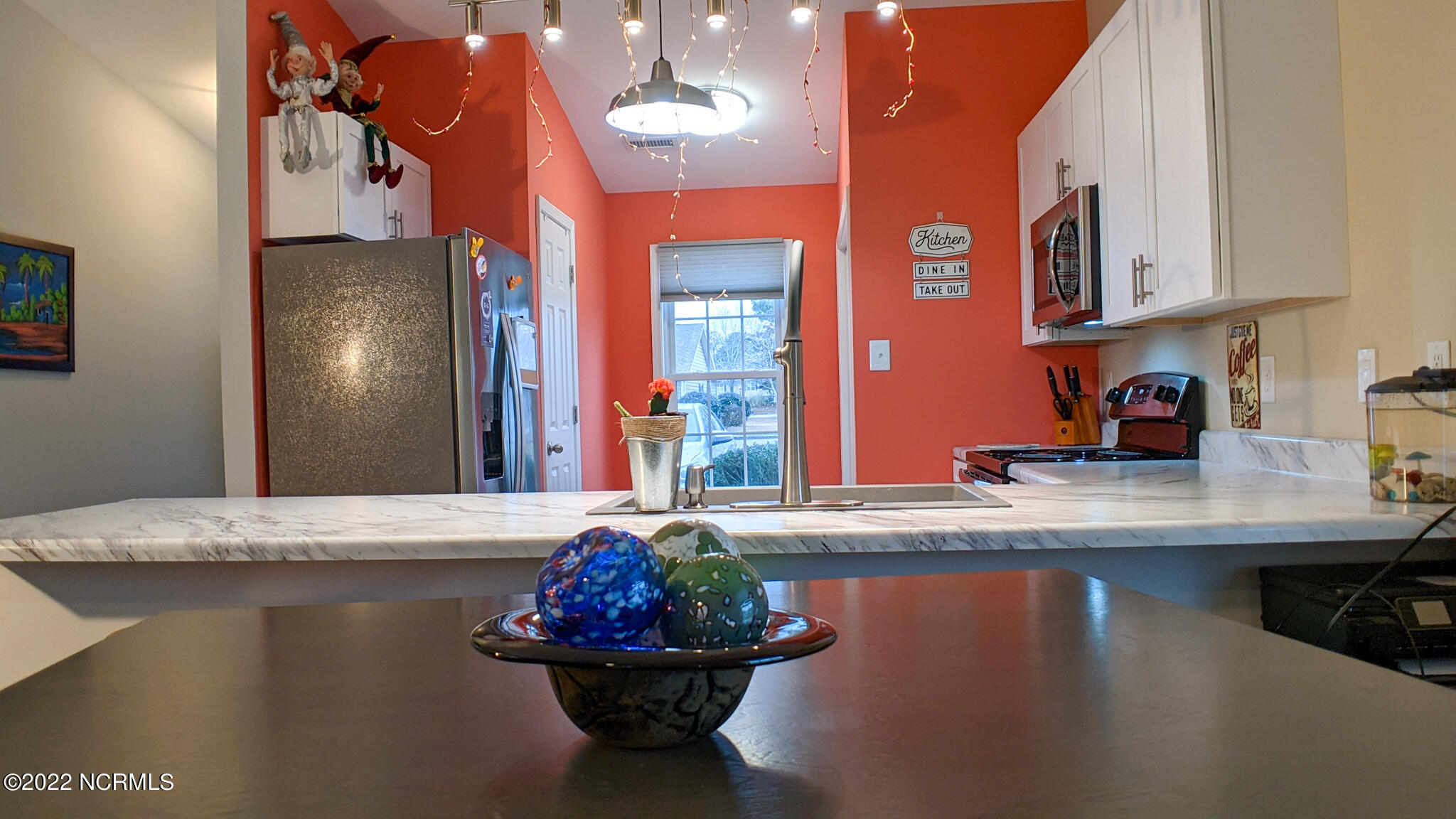 601 Peletier Loop Road, Unit B7 Swansboro, NC 28584 - Photo 4 of 19 Kitchen view from living dining combo