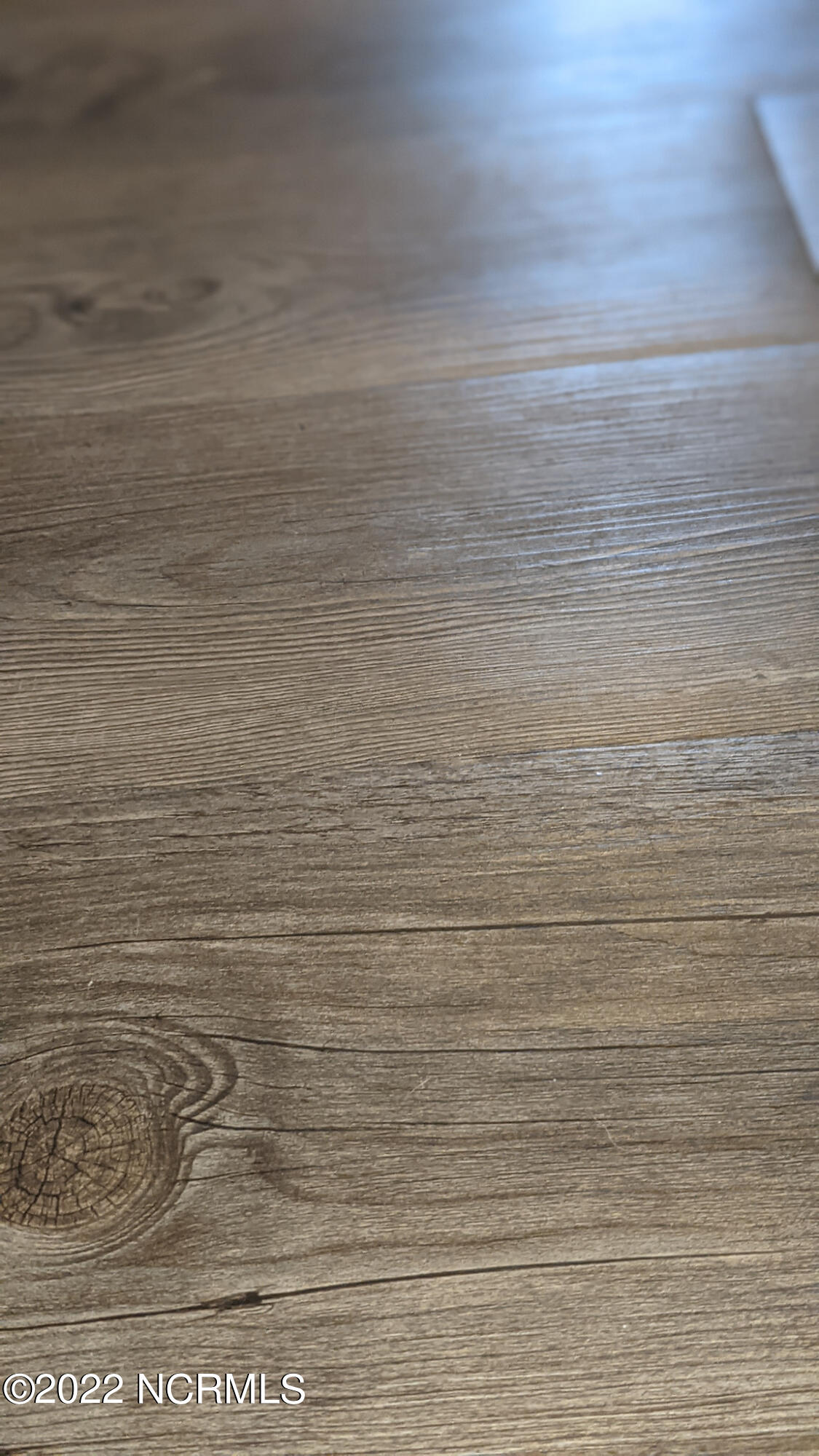 601 Peletier Loop Road, Unit B7 Swansboro, NC 28584 - Photo 6 of 19 foyer, living room, and hall flooring