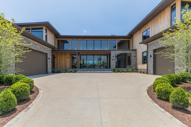 a living room with furniture ceiling fan and a rug