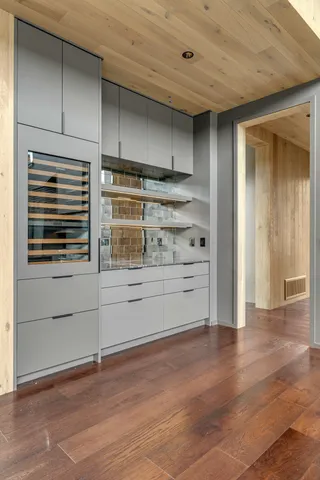 a bathroom with a shower and a mirror