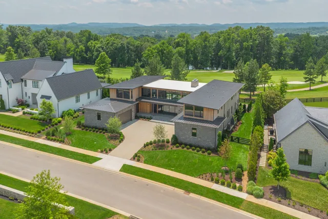 a view of a lobby area with furniture and floor to ceiling window