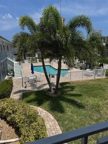 a view of a garden with a lake