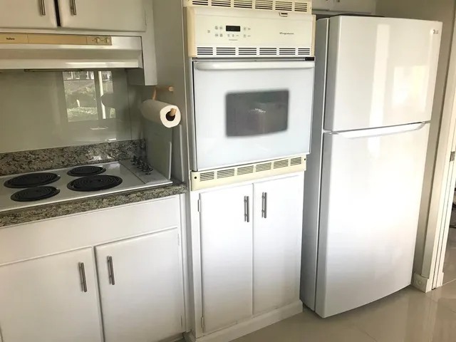 a close view of a refrigerator in kitchen