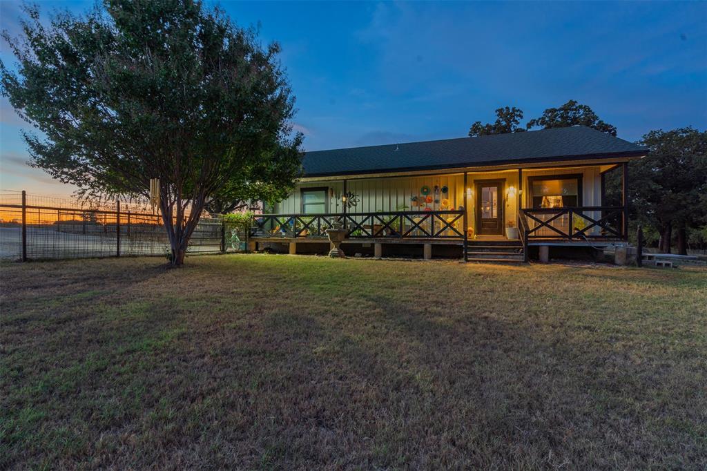 9700 Nix Road Tolar, TX 76476 - Photo 32 of 39 a view of a house with a yard