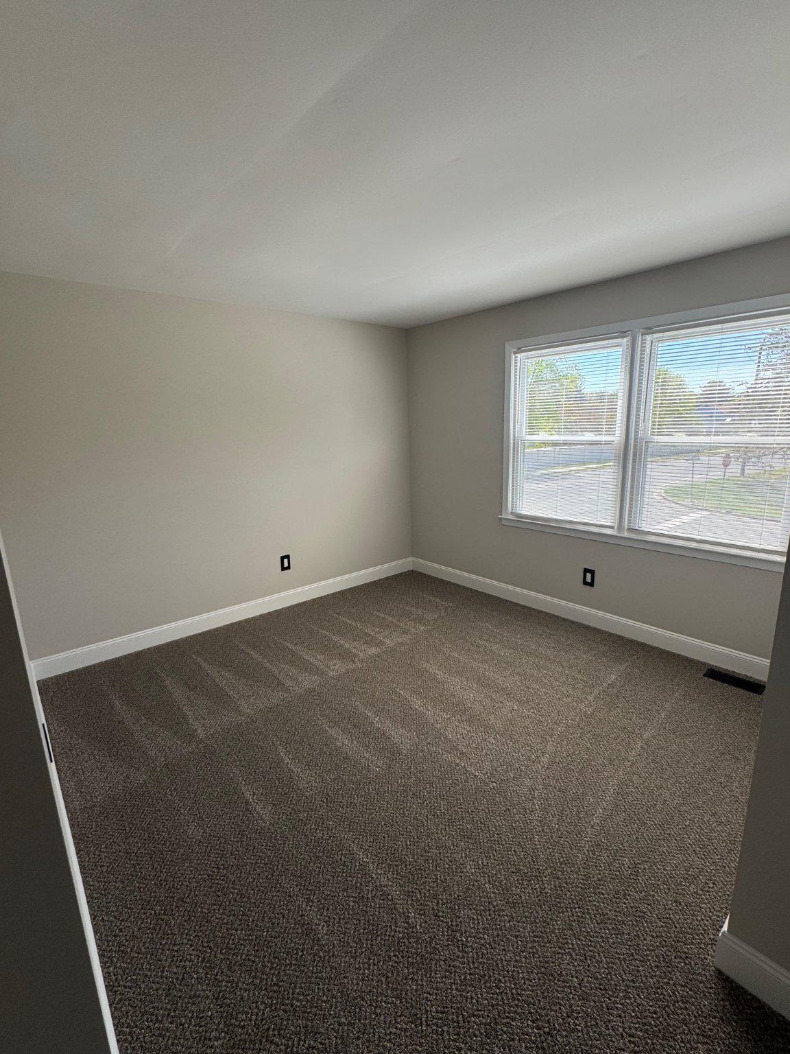 8 Framingham Road Beverly, NJ 08010 - Photo 28 of 35 an empty room with a window