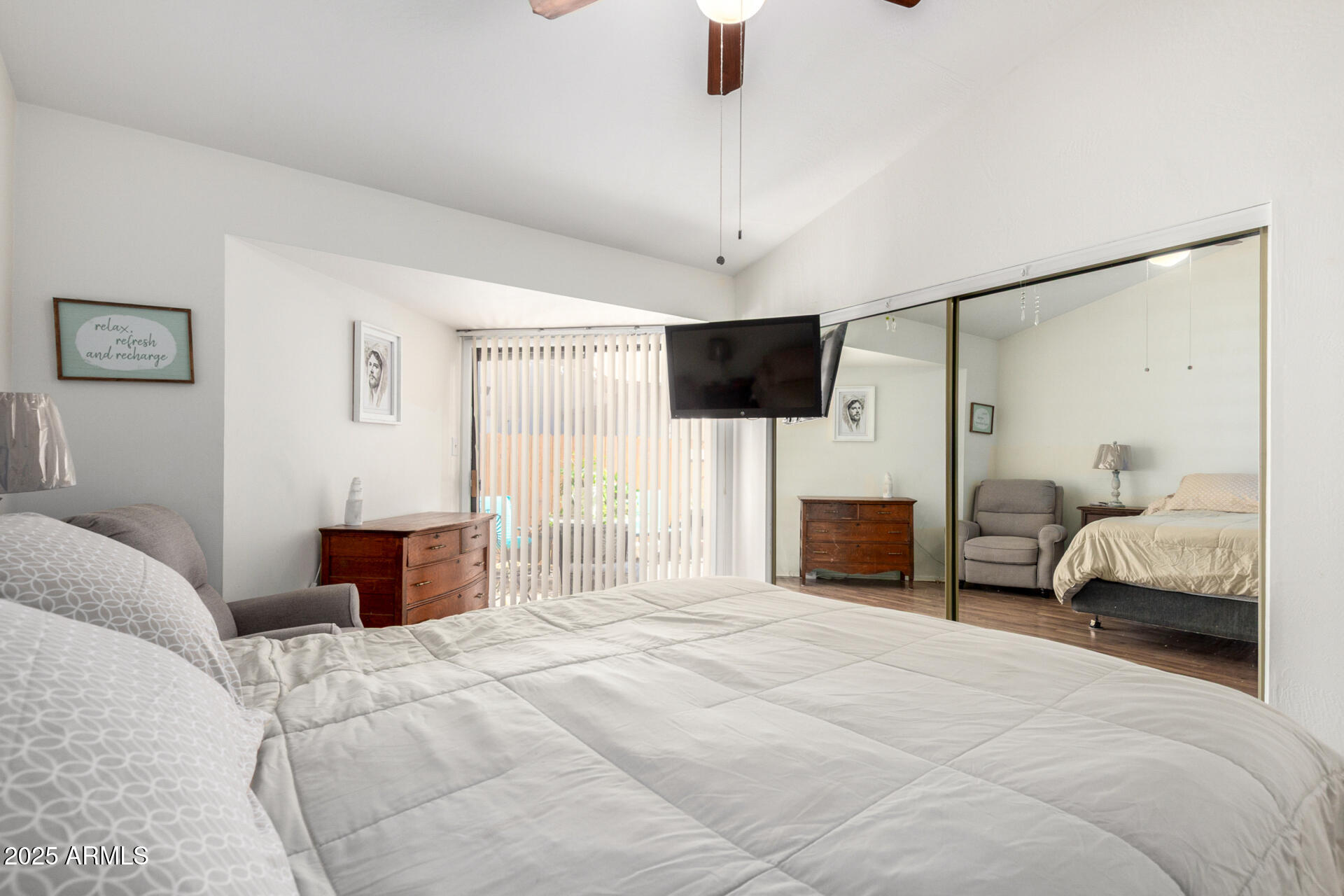 2455 East Broadway Road, Unit 73 Mesa, AZ 85204 - Photo 17 of 35 a bedroom with a bed couch and a window