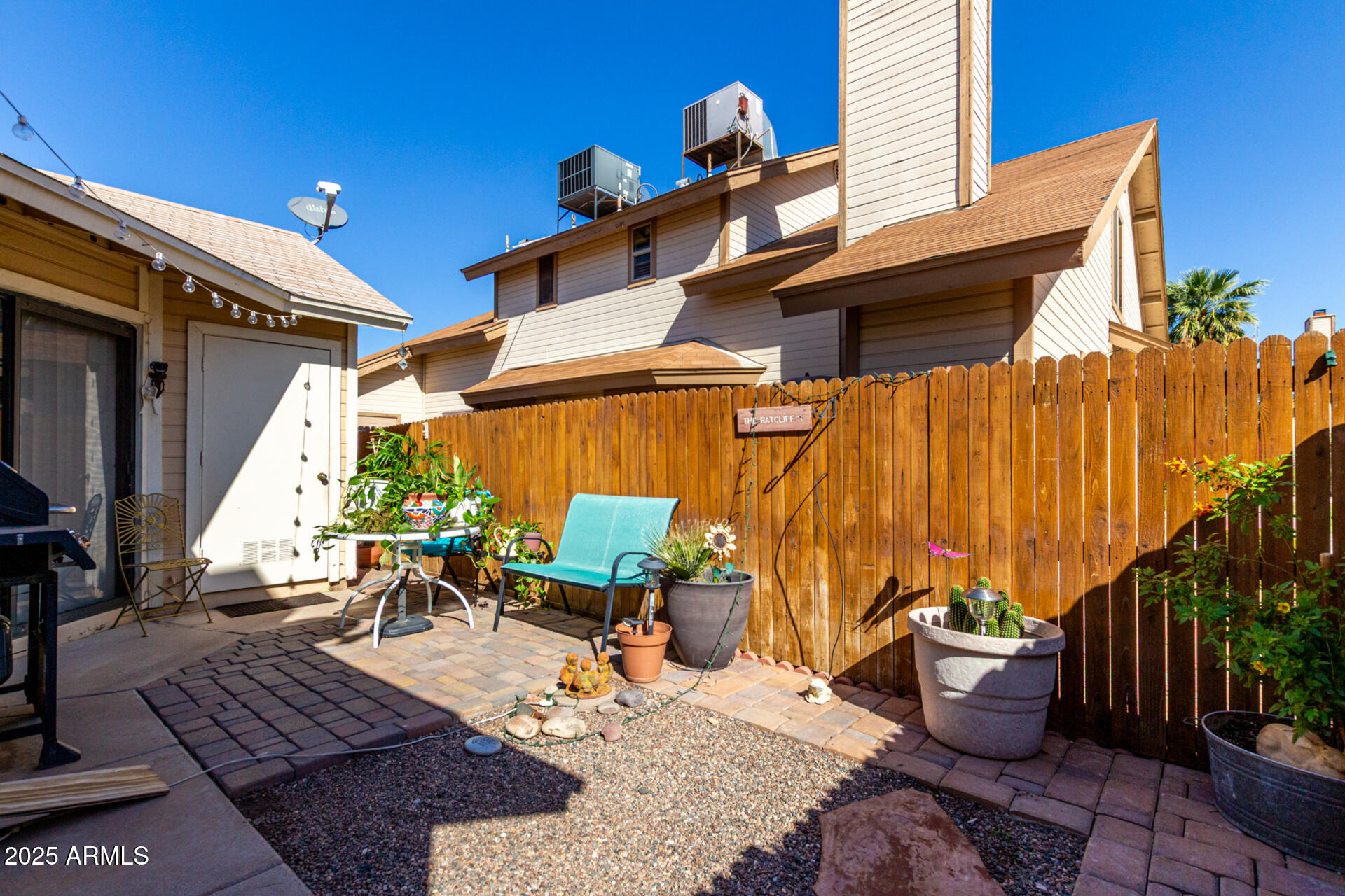 2455 East Broadway Road, Unit 73 Mesa, AZ 85204 - Photo 26 of 35 a view of a patio with couches and potted plants
