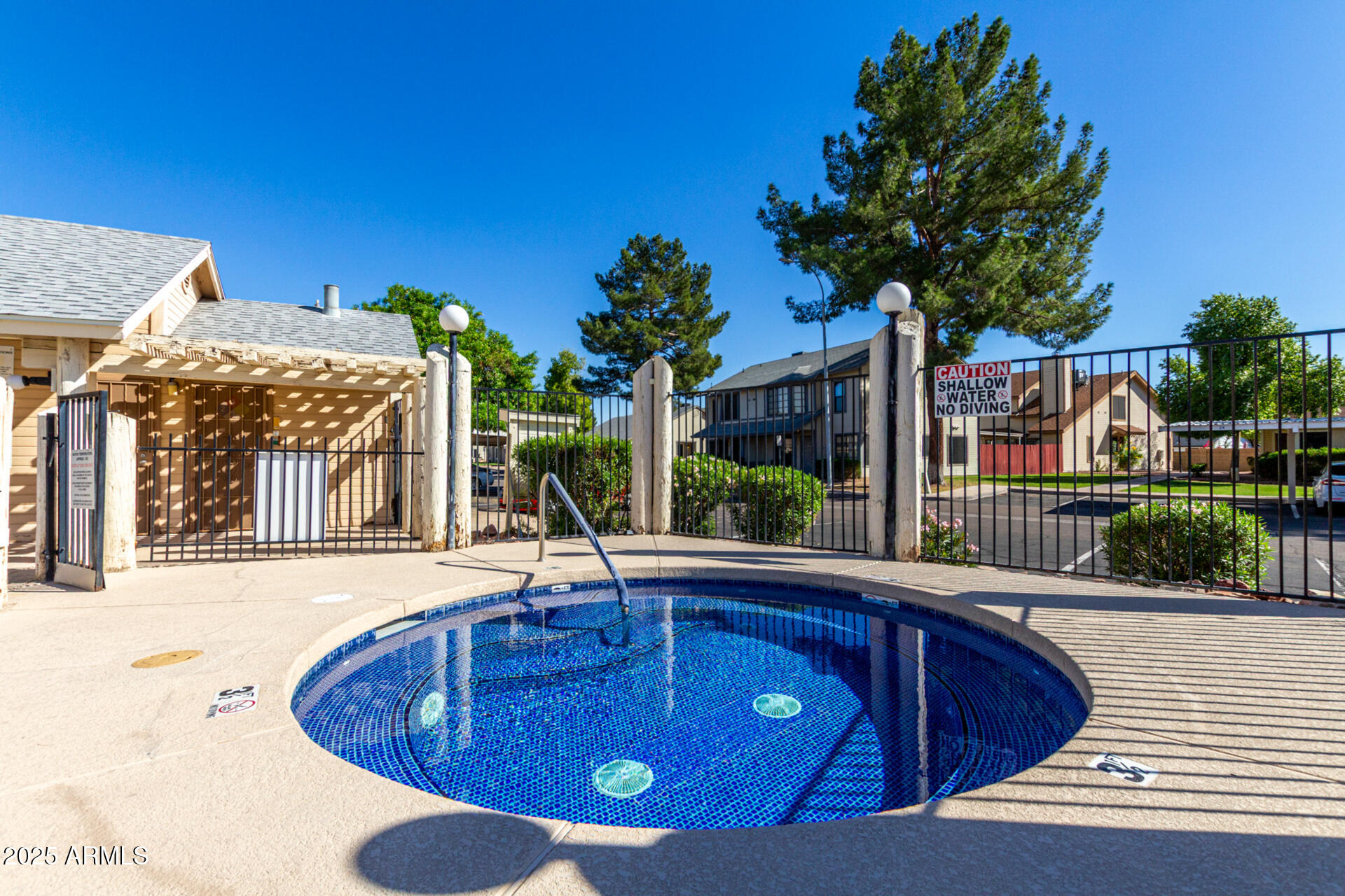 2455 East Broadway Road, Unit 73 Mesa, AZ 85204 - Photo 33 of 35 a view of a house with swimming pool and a porch
