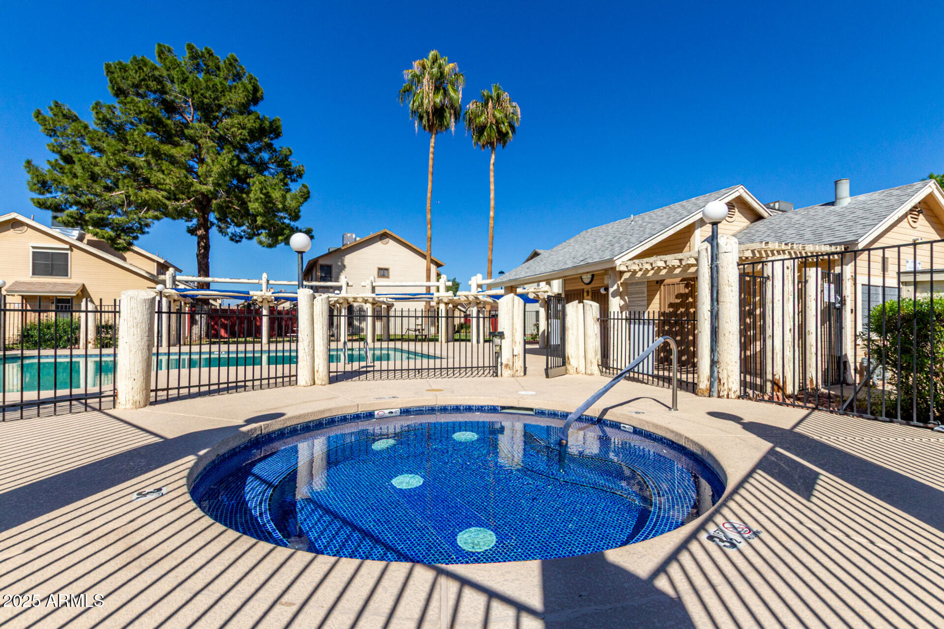 2455 East Broadway Road, Unit 73 Mesa, AZ 85204 - Photo 34 of 35 a view of a house with swimming pool porch and furniture