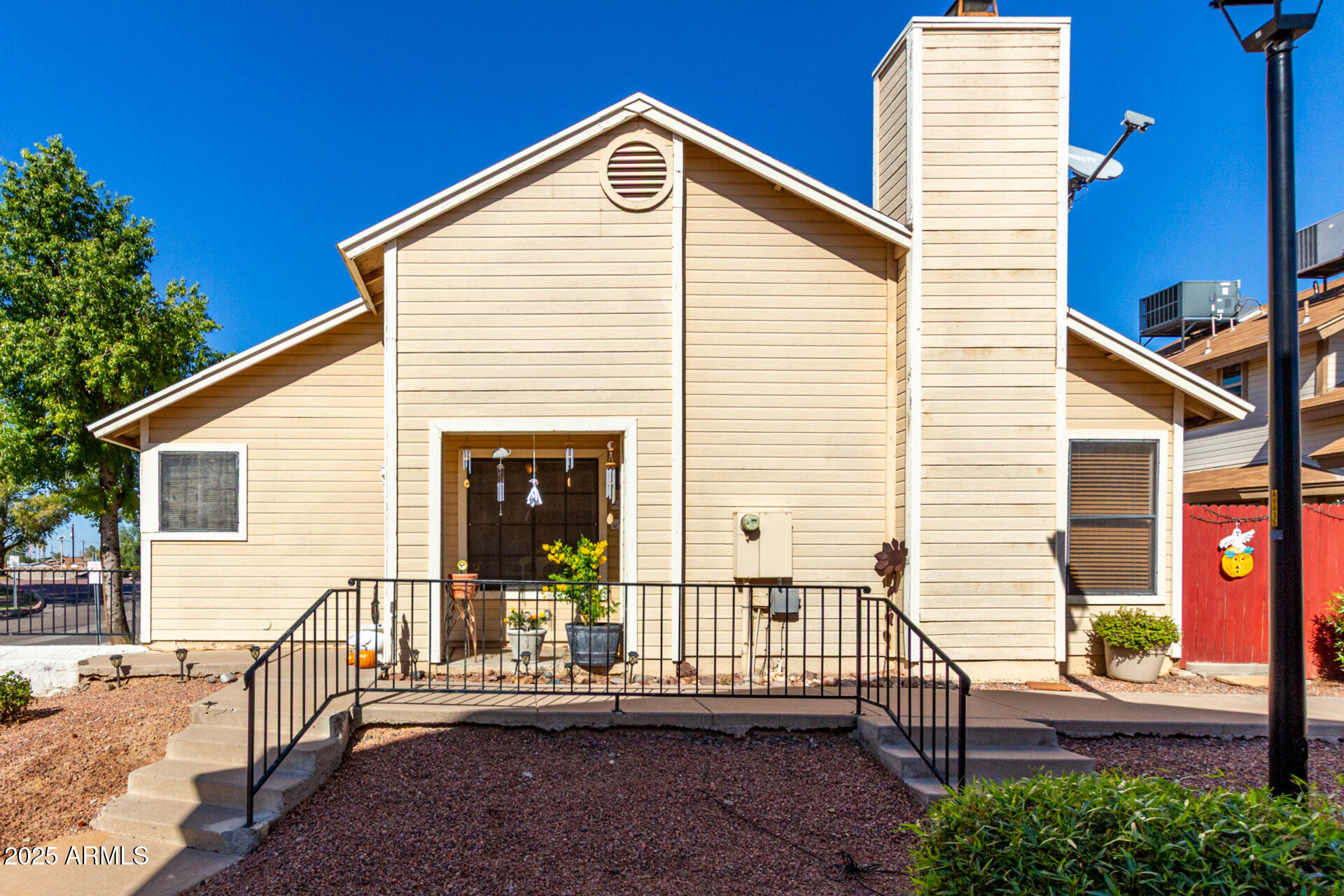 2455 East Broadway Road, Unit 73 Mesa, AZ 85204 - Photo 5 of 35 a view of a house with a small deck