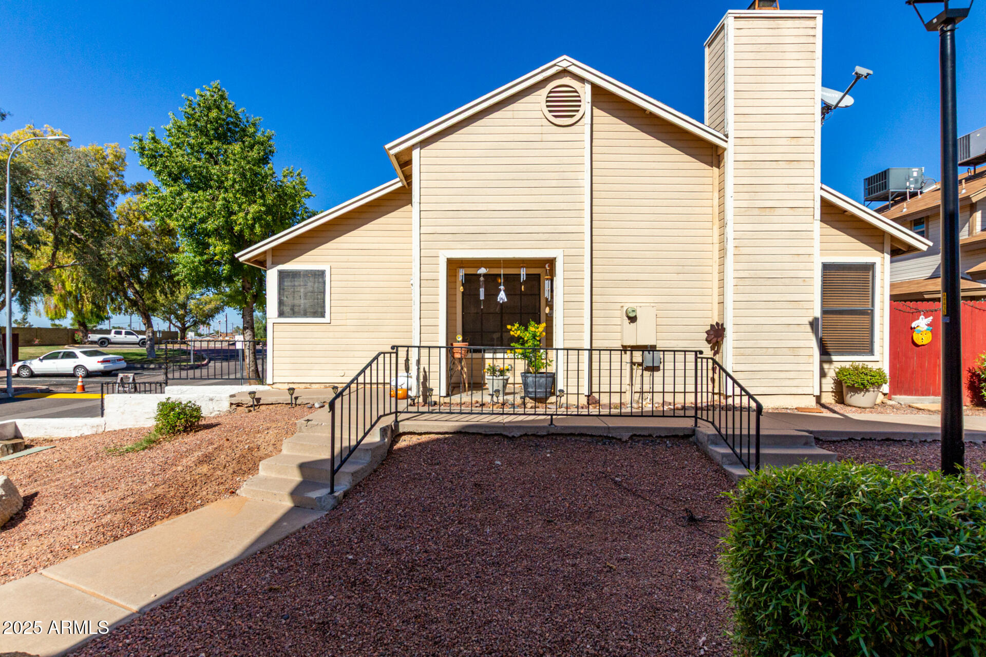 2455 East Broadway Road, Unit 73 Mesa, AZ 85204 - Photo 6 of 35 a view of a house with backyard and porch
