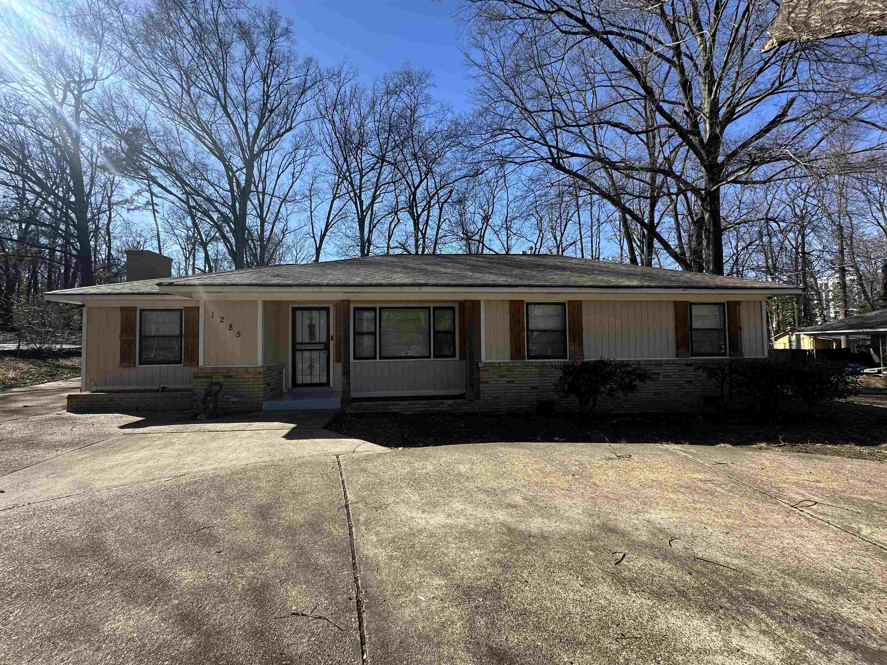 1285 Old Hickory Road Memphis, TN 38116 - Photo 30 of 31 Single story home featuring brick siding and a chimney