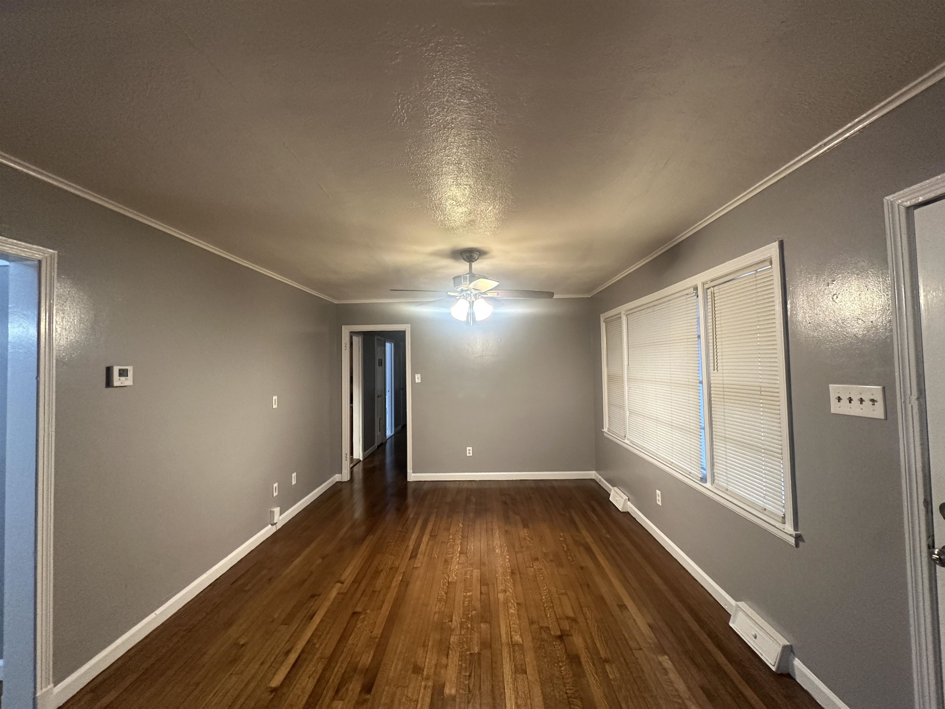 1285 Old Hickory Road Memphis, TN 38116 - Photo 3 of 31 Interior space featuring ornamental molding, dark wood finished floors, and baseboards